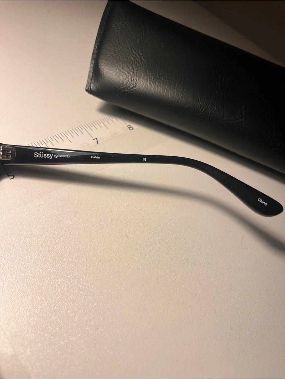 Stussy Black Frame Sunglasses with Purple Tinted Lenses